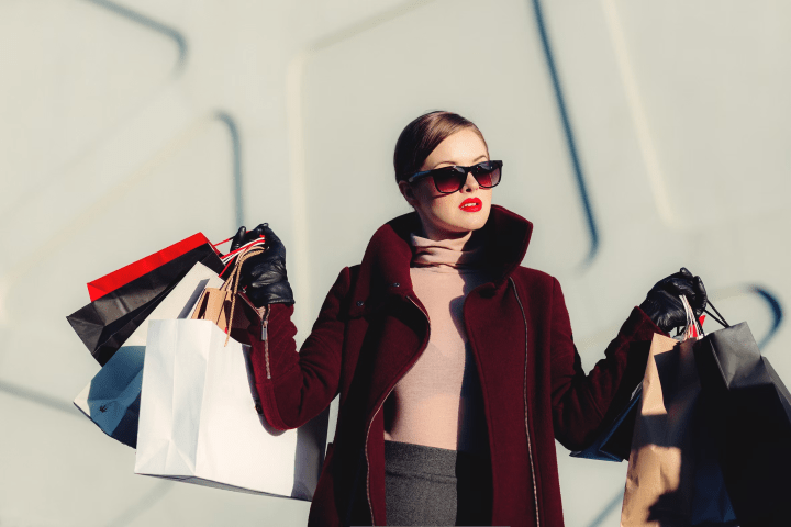 A person holding shopping bags.